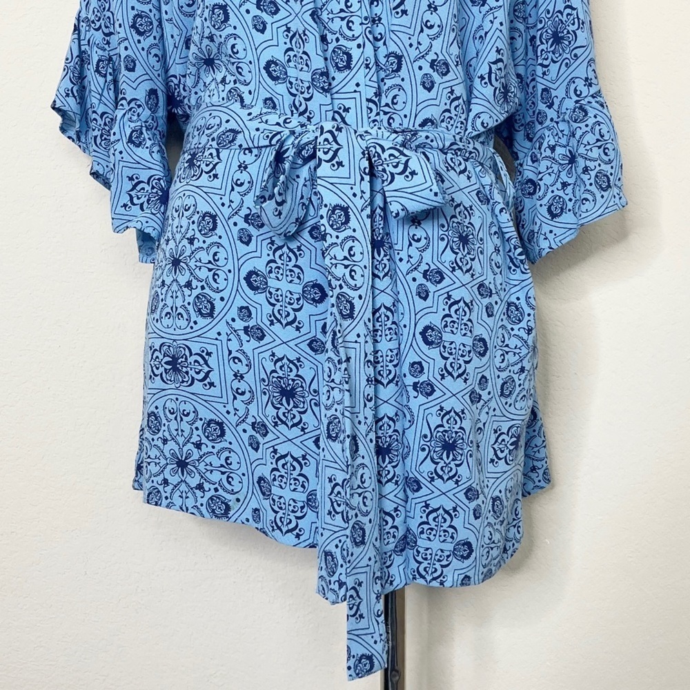 Ruby Ribbon Ruffle Wrap Blue Floral Top - Picture 5 of 13
